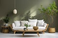 Cozy wooden sofa with white cushions near dark green wall. Side table with houseplant and potted tree. Scandinavian interior