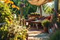 Cozy wooden terrace with rustic wooden furniture, soft colorful pillows and blankets, sunshade and flower pots. Charming sunny