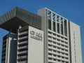 The CP ALL Academy building soaring into blue sky