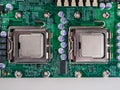 CPU connector on the circuit motherboard with pressure contacts for connecting a silicon microprocessor, CPU selection during comp