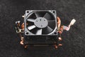 CPU heat sinker from a PC. Copper heatsinker with a fan for cool