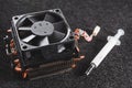 CPU heat sinker from a PC and a thermal grease. Royalty Free Stock Photo