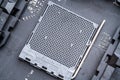 CPU socket and processor on the motherboard. Focus on the motherboard. Royalty Free Stock Photo