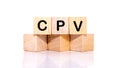 CPV cost per view. Letters of the word CPV on wooden blocks isolated on a white background