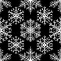 Simple seamless pattern with snowflakes on black background Royalty Free Stock Photo