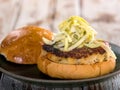 Crab cake sandwich with coleslaw garnish Royalty Free Stock Photo