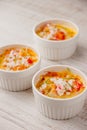 Crab cocotte in the white ramekins vertical Royalty Free Stock Photo