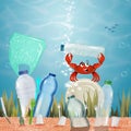 Crab collects plastic in the sea