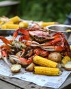 Crab and corn and potato dish is on a table Royalty Free Stock Photo