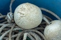 Crab fishing floats and rope in a blue bucket