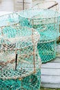 Crab and lobster pots on a pontoon covered with morning frost Royalty Free Stock Photo