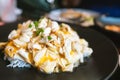 Crab omelette over rice, The fluffy omelette with chunks of fresh crab meat is placed on a mound of steamed rice.