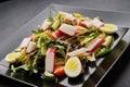 Crab stick salad with fresh vegetable and eggs Royalty Free Stock Photo