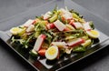 Crab stick salad with fresh vegetable and eggs Royalty Free Stock Photo