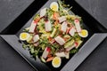 Crab stick salad with fresh vegetable and eggs Royalty Free Stock Photo