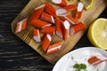 Crab sticks, sauce in a board meal group delicious wooden background pr oduce