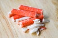 Crab sticks slice on wooden cutting board for food Royalty Free Stock Photo