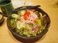 Crabstick fresh salad with tobiko and sesame dressing