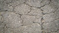 Crack on the asphaltic surface. Natural pattern on textured surface. Ruined of the walkway. Royalty Free Stock Photo