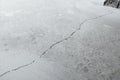 Crack in cement floor from shrinkage of house Royalty Free Stock Photo