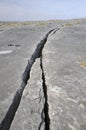 Crack in Limestone Pavement Royalty Free Stock Photo