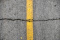 Crack on line yellow on road texture