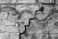 Crack on old brick broken wall texture damaged background Royalty Free Stock Photo