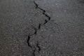 Crack in the road pavement Royalty Free Stock Photo