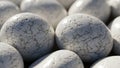 Close up textured white pebbles with intricate crack patterns and smooth reflective surfaces creating a natural Royalty Free Stock Photo