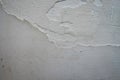 Crack. Texture of old painted white plaster. Cracked wall. white wall with cracks Royalty Free Stock Photo