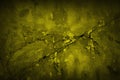 Toned old cracked concrete wall. Khaki olive green yellow. Grunge background. Broken, collapsed. Horror, creepy.