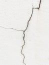 Crack on white concrete wall Royalty Free Stock Photo