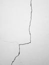 Crack on white wall background Royalty Free Stock Photo