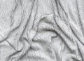 Cracked aged leather drapered close-up fabric wrinkled gray background