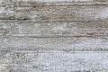 Cracked aged wooden surface gray white painted wood planks texture background backdrop