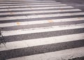 Cracked asphalt crosswalk, pedestrian crossing Royalty Free Stock Photo