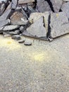 Cracked asphalt pieces background - concept image
