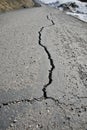 Cracked asphalt road surface texture Royalty Free Stock Photo