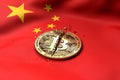 Cracked Bitcoin coin on Chinese flag. Bad Bitcoin condition in China Kong concept. 3D Rendering