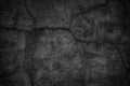 Cracked black concrete wall, gloomy cement texture background Royalty Free Stock Photo