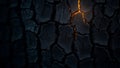 Cracked black surface with glowing orange fissures, showcasing intricate textures and patterns. contrast between dark and light Royalty Free Stock Photo