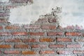 Cracked brick and concrete wall. Old bricks wall and cement. Texture of brick wall pattern background. Abstract wallpaper texture Royalty Free Stock Photo