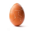 Cracked brown egg. Royalty Free Stock Photo