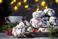 Cracked chocolate chip cookies in powdered sugar, crispy on the outside and soft on the inside. Christmas composition Royalty Free Stock Photo