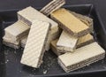 Cracked chocolate filled wafers, wafer bar slices, long cut biscuit sticks