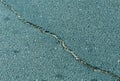 Cracked color asphalt surface. Royalty Free Stock Photo