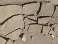 Cracked concrete. The asphalt is broken into pieces. Cracked road surface. Texture. Royalty Free Stock Photo