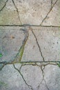 Cracked concrete brick pathway texture. Broken sidewalk tiles Royalty Free Stock Photo
