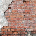 Cracked concrete brick wall.