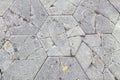 Cracked Concrete Hexagon Paver Bricks on Walkway